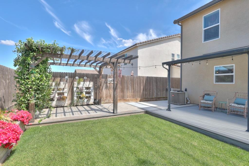 2129 Redding Way Atwater, CA 95301 - Photo 52 of 75 a front view of a house with a yard