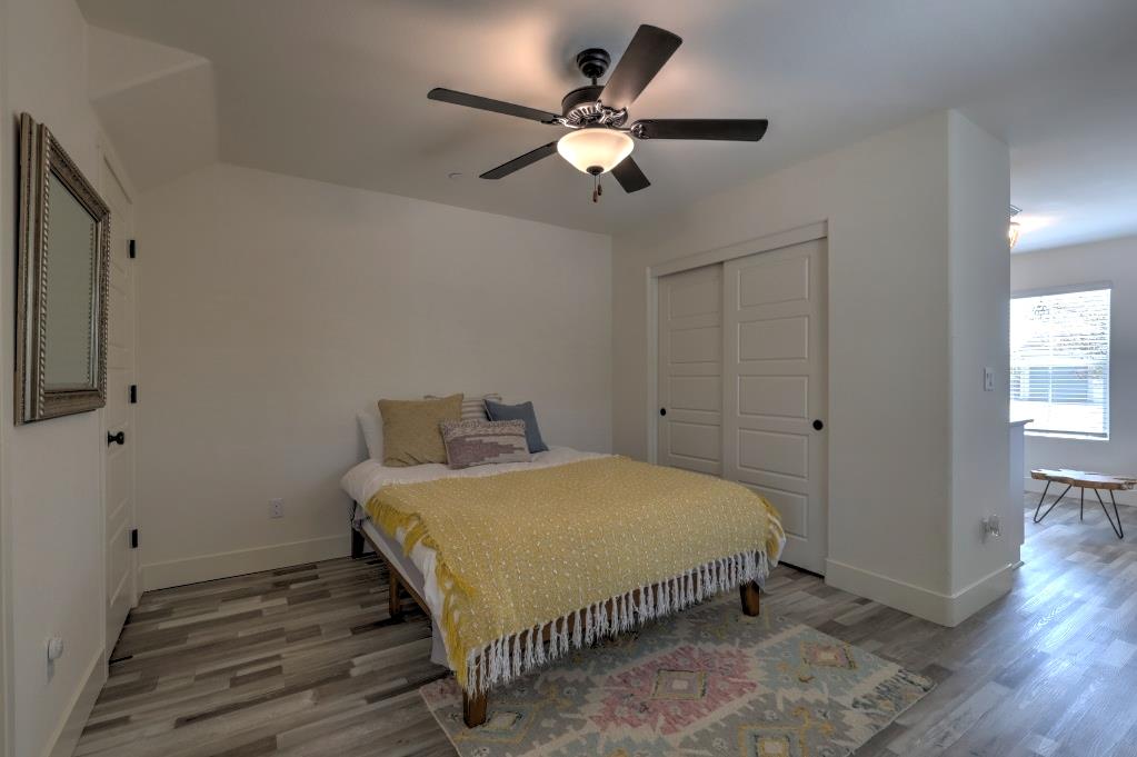 2129 Redding Way Atwater, CA 95301 - Photo 65 of 75 a bedroom with a bed and a ceiling fan