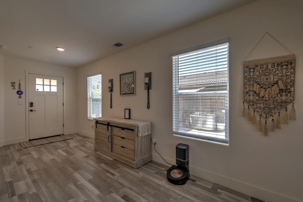 2129 Redding Way Atwater, CA 95301 - Photo 10 of 75 a view of a workspace with furniture and a window