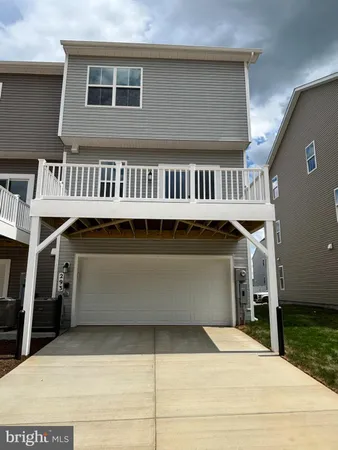 a front view of a house with balcony