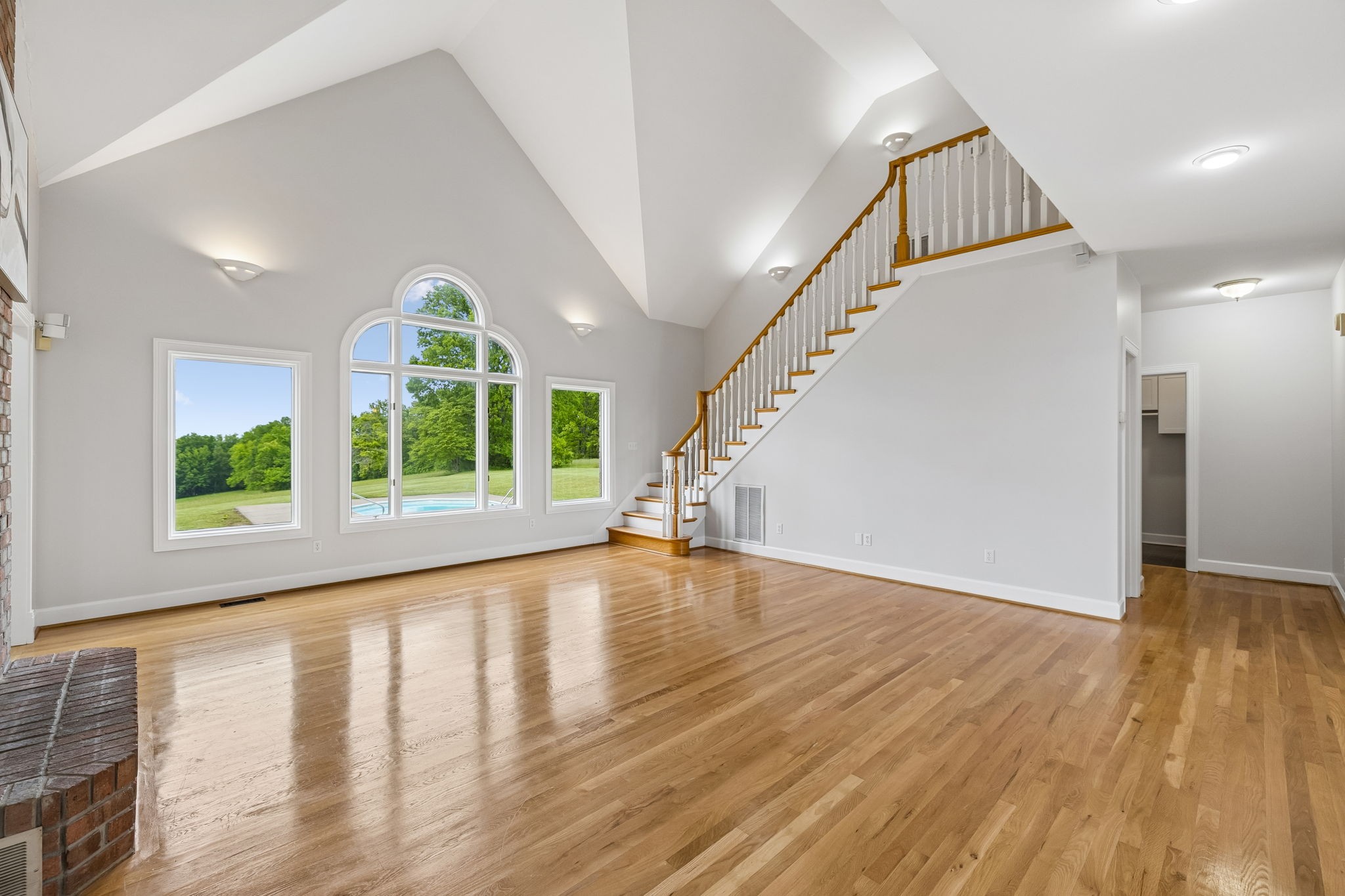 314 Fairview Road Dickson, TN 37055 - Photo 25 of 81 a view of an empty room with wooden floor and a window