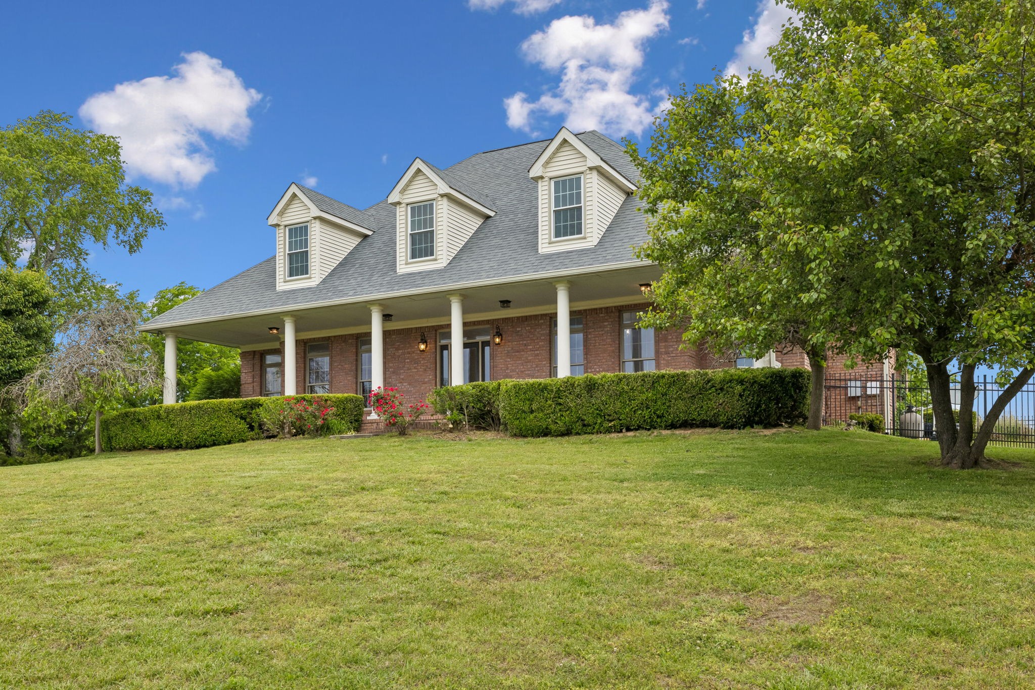 314 Fairview Road Dickson, TN 37055 - Photo 6 of 81 a front view of a house with a garden