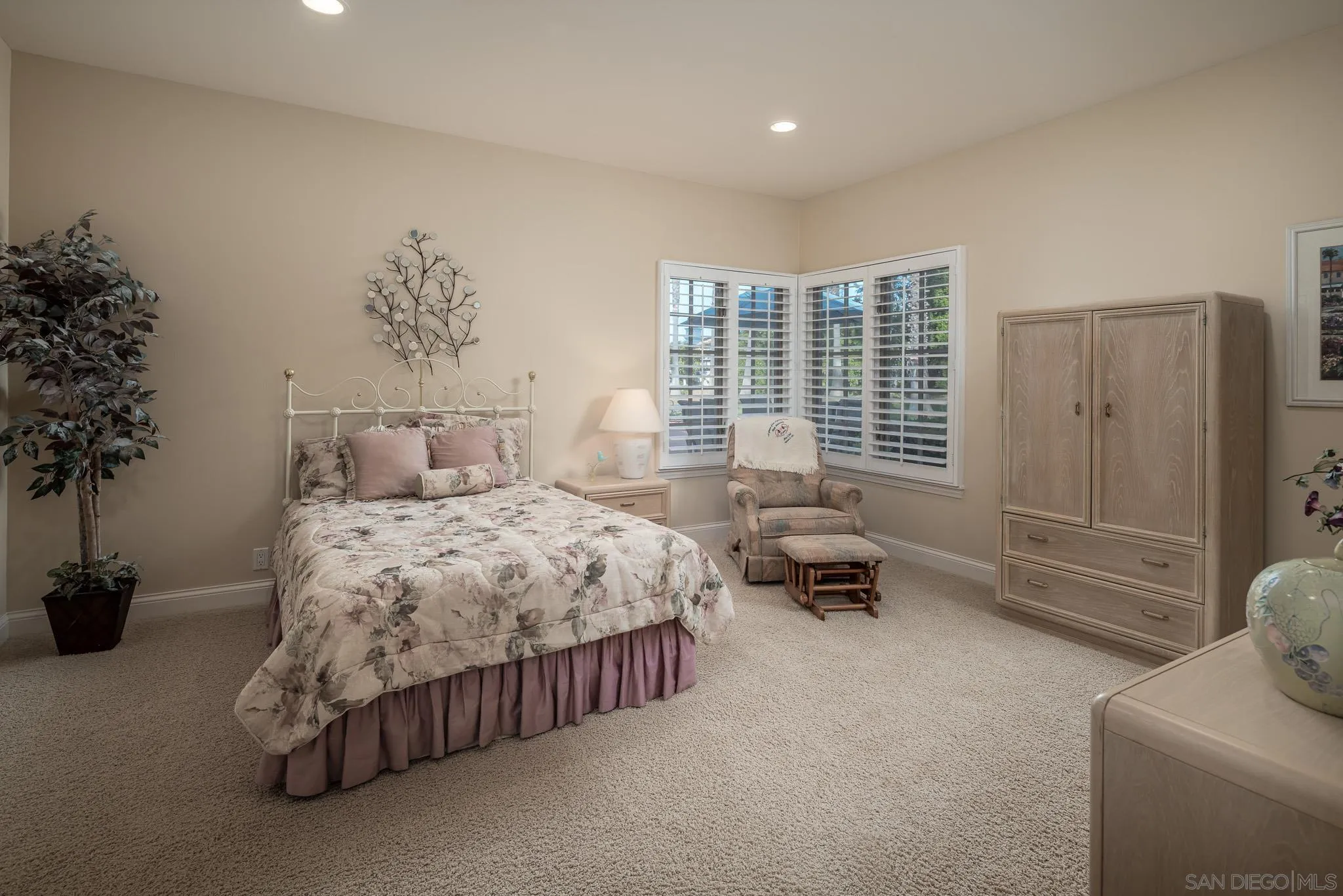 18221 Via Ascenso Rancho Santa Fe, CA 92067 - Photo 24 of 37 a bedroom with a bed and a couch