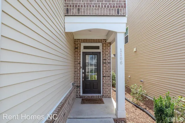 a front view of a house with a door