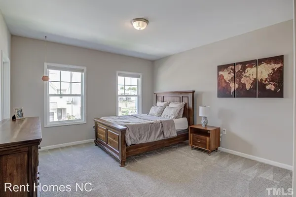 a room with a bed and a window