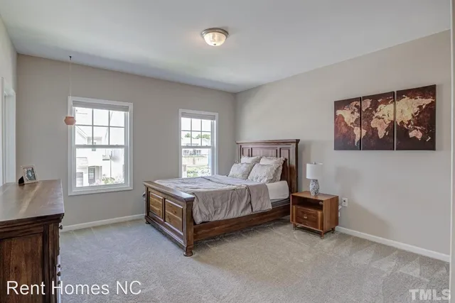 a room with a bed and a window