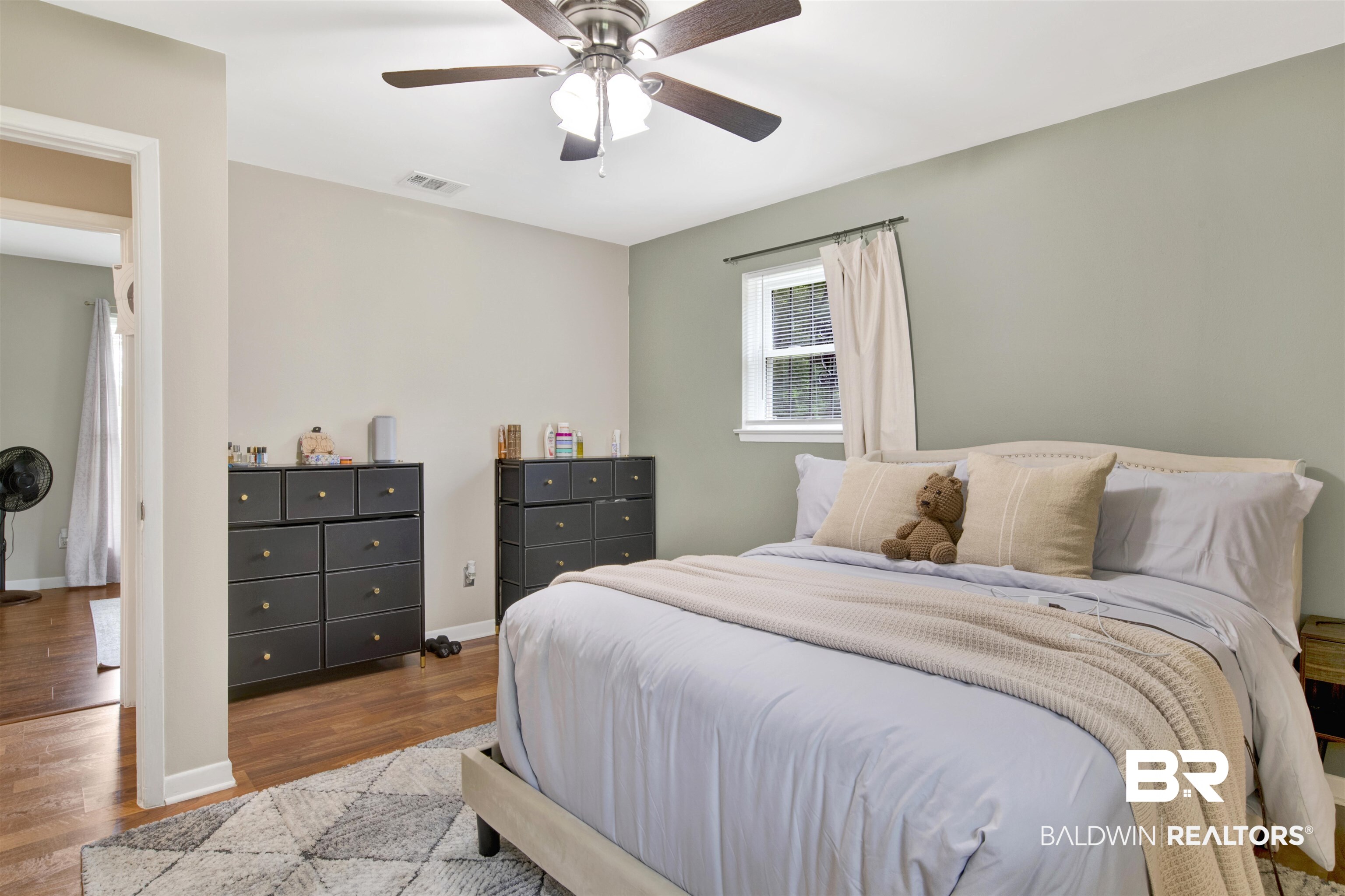 1476 Boudousquie Street Mobile, AL 36605 - Photo 17 of 34 Bedroom with wood finished floors and a ceiling fan