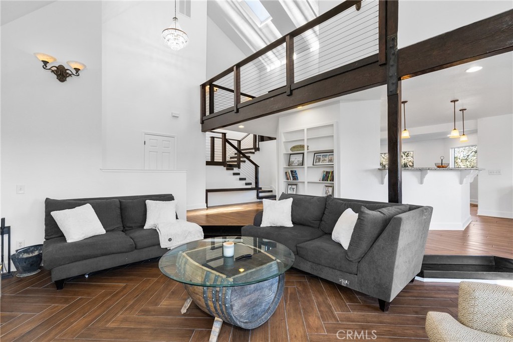 8110 Castenada Lane Atascadero, CA 93422 - Photo 14 of 75 a living room with furniture and wooden floor