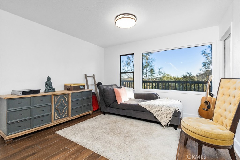 8110 Castenada Lane Atascadero, CA 93422 - Photo 15 of 75 Next to the living room is an area that could be used as a dining area or sitting area as the current owners use it.