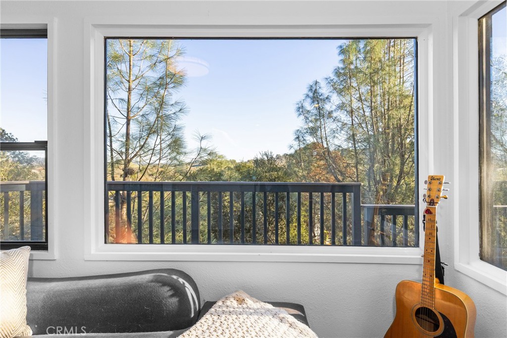 8110 Castenada Lane Atascadero, CA 93422 - Photo 16 of 75 a living room filled with furniture and a large window
