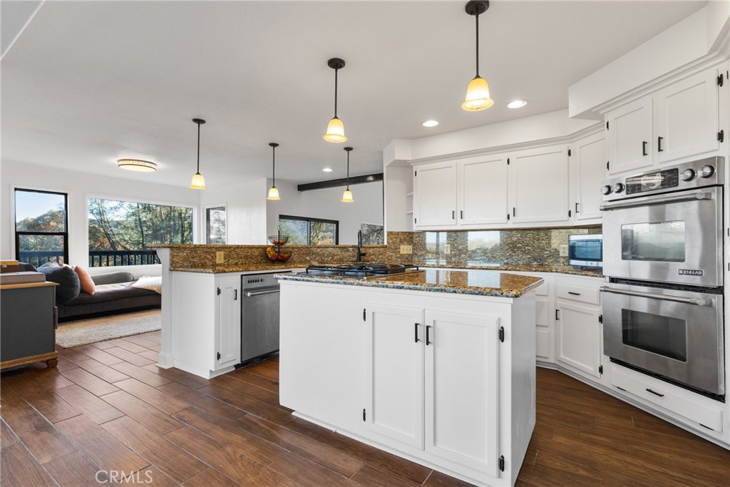8110 Castenada Lane Atascadero, CA 93422 - Photo 19 of 75 The kitchen island has additional storage and countertop space.