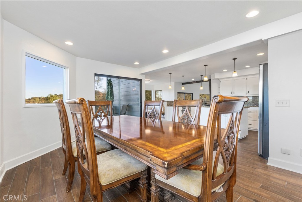 8110 Castenada Lane Atascadero, CA 93422 - Photo 26 of 75 Natural light pours in through the many windows and sliding glass doors.