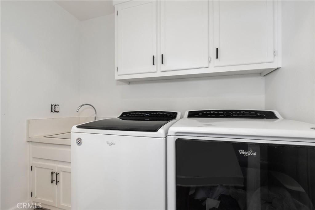 8110 Castenada Lane Atascadero, CA 93422 - Photo 29 of 75 a utility room with dryer and washer