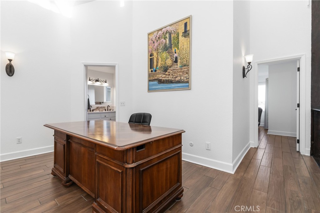 8110 Castenada Lane Atascadero, CA 93422 - Photo 37 of 75 a kitchen that has a sink and a wooden floor