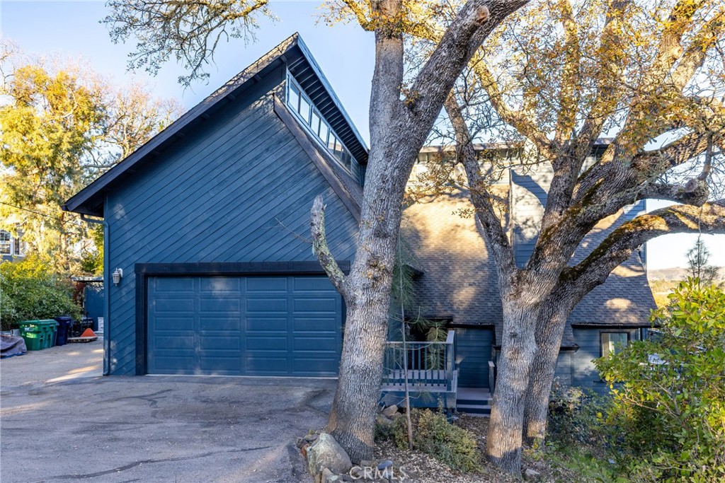 8110 Castenada Lane Atascadero, CA 93422 - Photo 4 of 75 a house is sitting in middle of forest