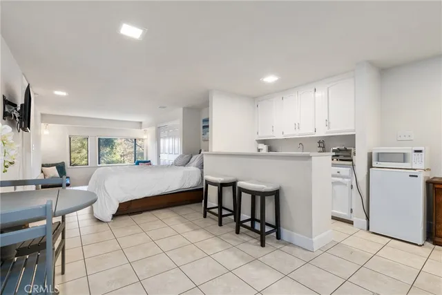 a view of a backyard with sitting area