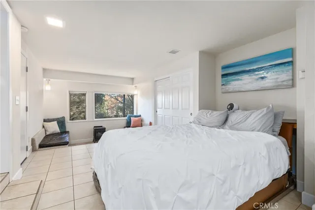 a view of a house with a snow on the road