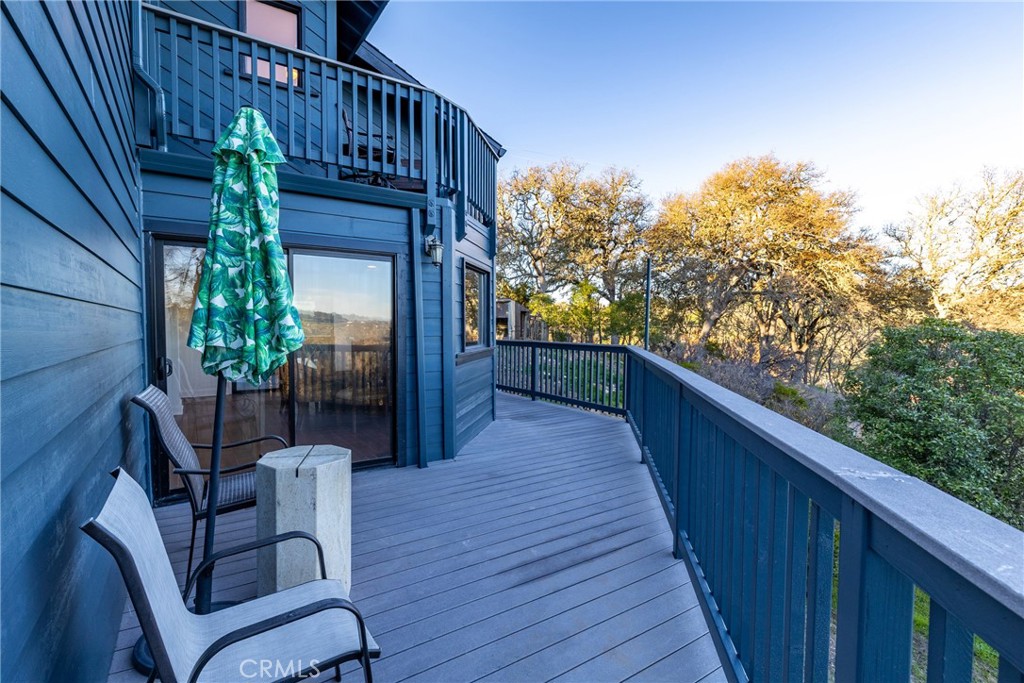 8110 Castenada Lane Atascadero, CA 93422 - Photo 61 of 75 a balcony with wooden floor potted plants and wooden floor