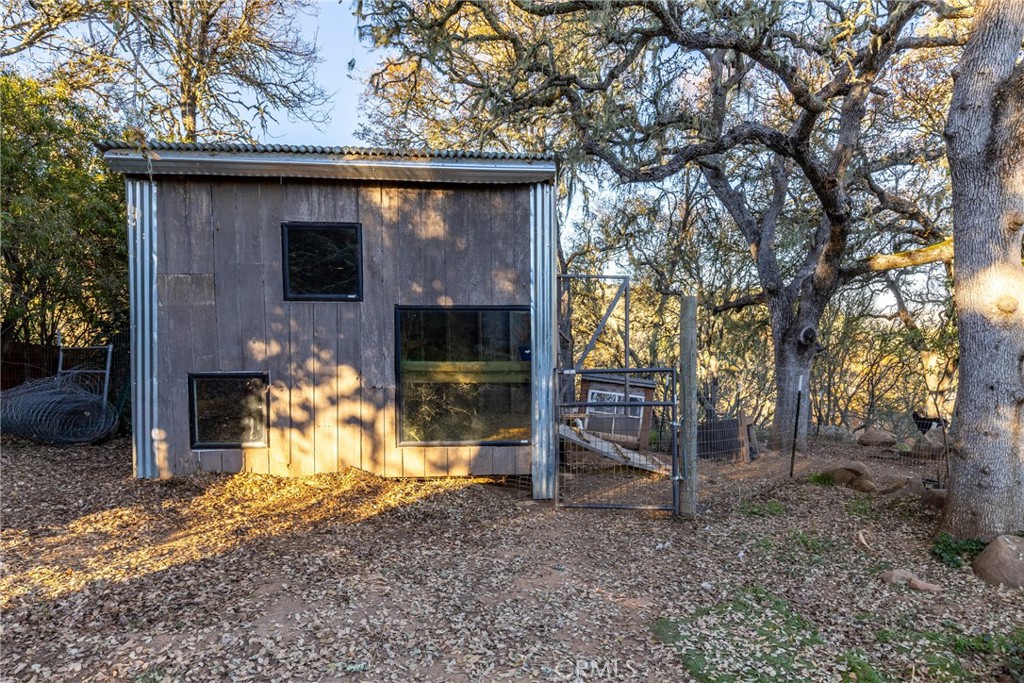 8110 Castenada Lane Atascadero, CA 93422 - Photo 69 of 75 a view of a house with a yard and a tree