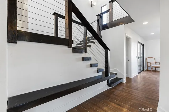 a view of balcony with furniture and wooden deck