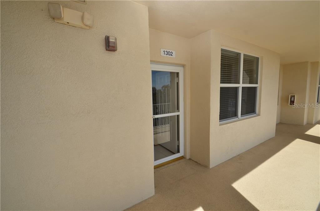 960 Starkey Road, Unit 1302 Largo, FL 33771 - Photo 1 of 1 a view of an empty room with a window