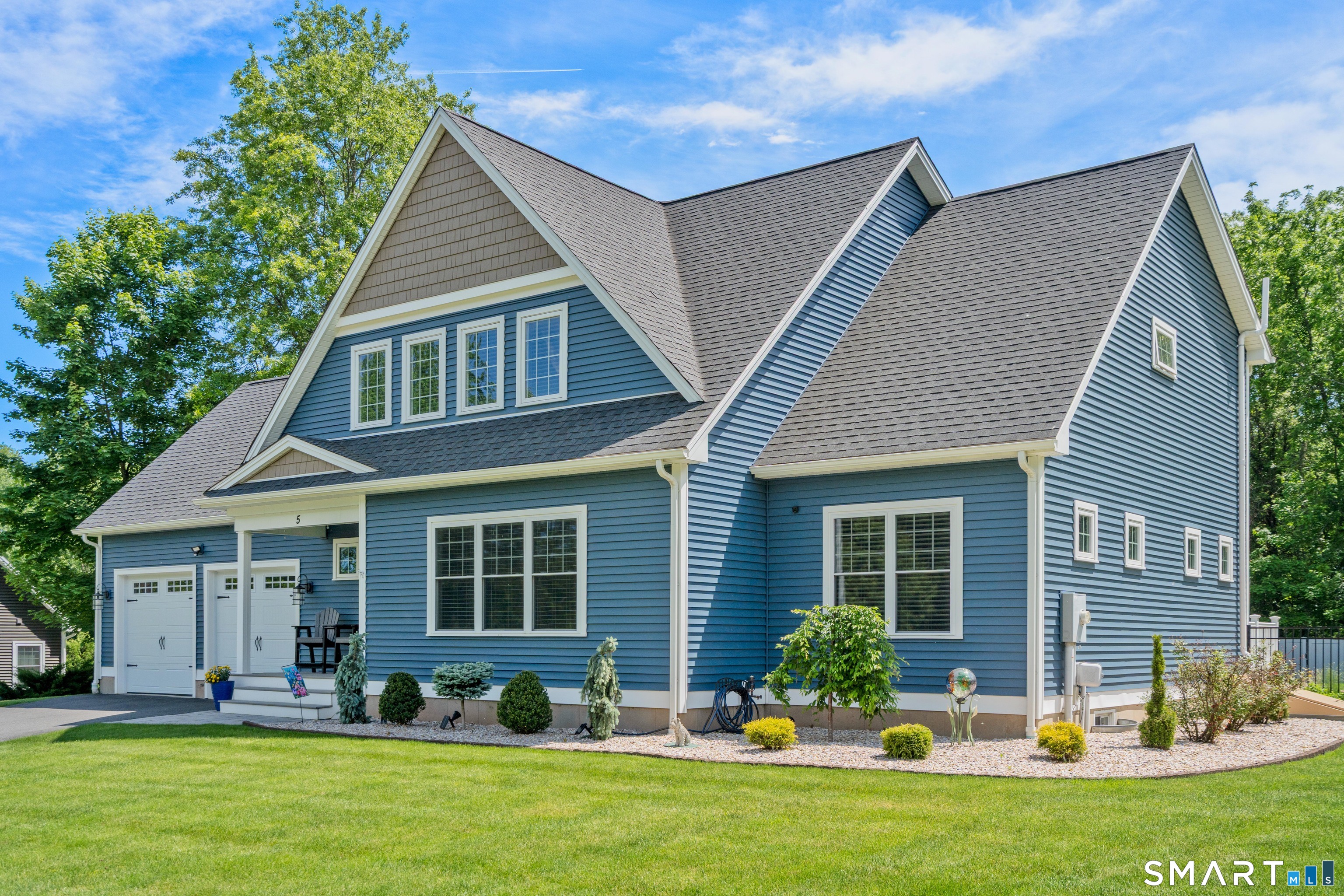 5 Limric Lane Suffield, CT 06078 - Photo 35 of 36 a front view of a house with a yard