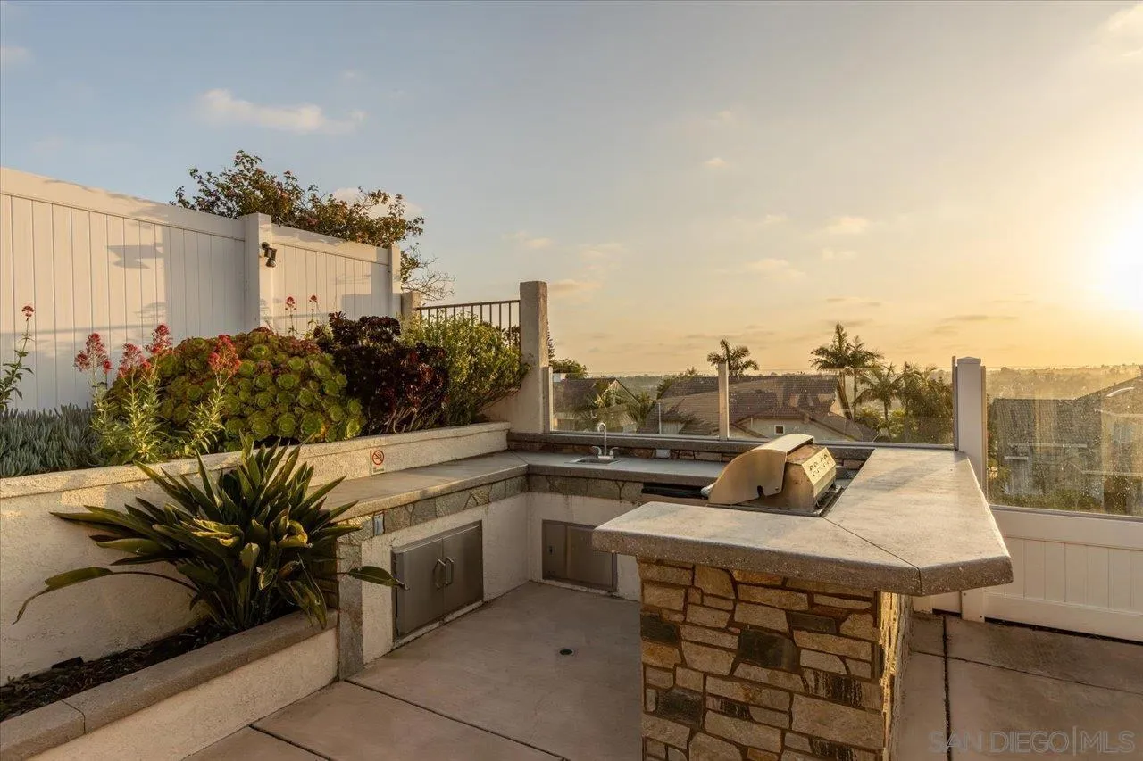1321 Clear Crest Circle Vista, CA 92084 - Photo 24 of 30 a terrace with a table and chairs
