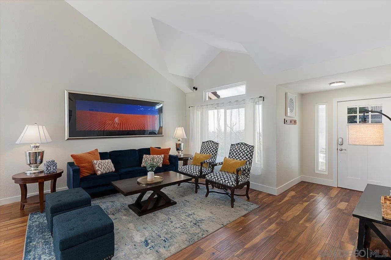 1321 Clear Crest Circle Vista, CA 92084 - Photo 5 of 30 a living room with furniture and a wooden floor