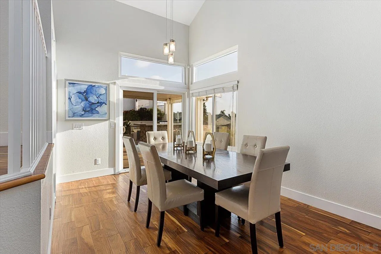 1321 Clear Crest Circle Vista, CA 92084 - Photo 9 of 30 a view of a dining room with furniture and wooden floor