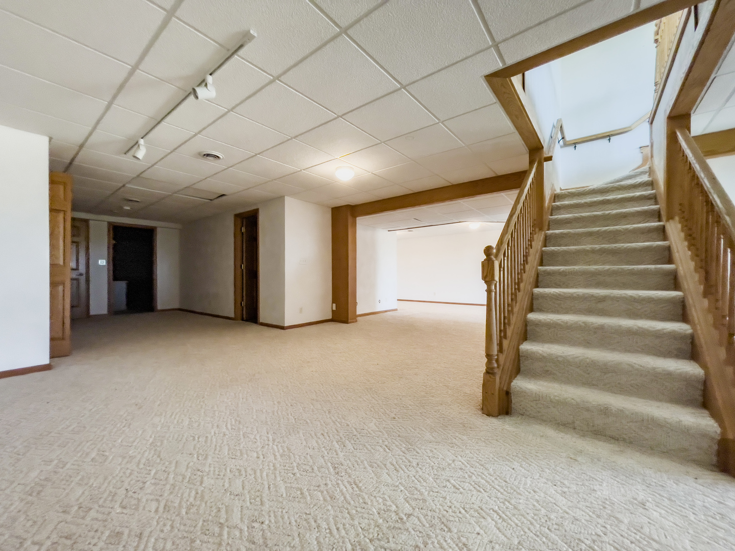15648 Murphy Road Winnebago, IL 61088 - Photo 26 of 35 a view of an empty room with a staircase