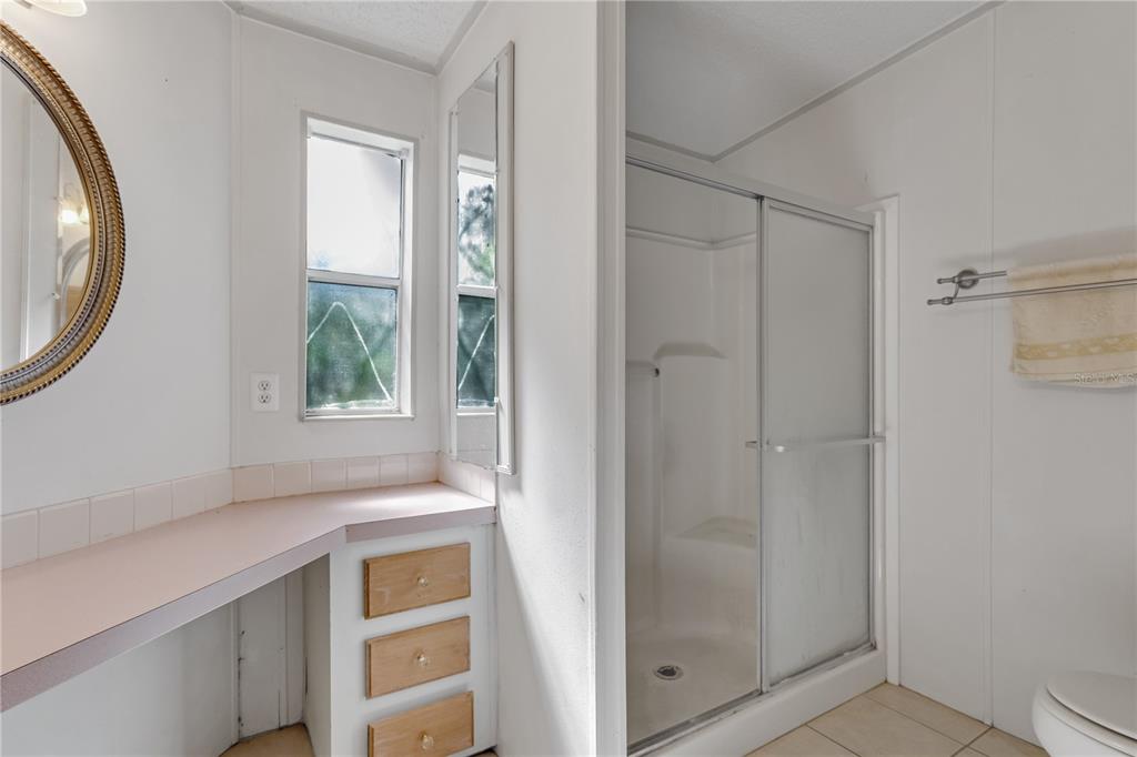 300 Beech Court Cocoa, FL 32926 - Photo 17 of 32 a view of walk in closet with window