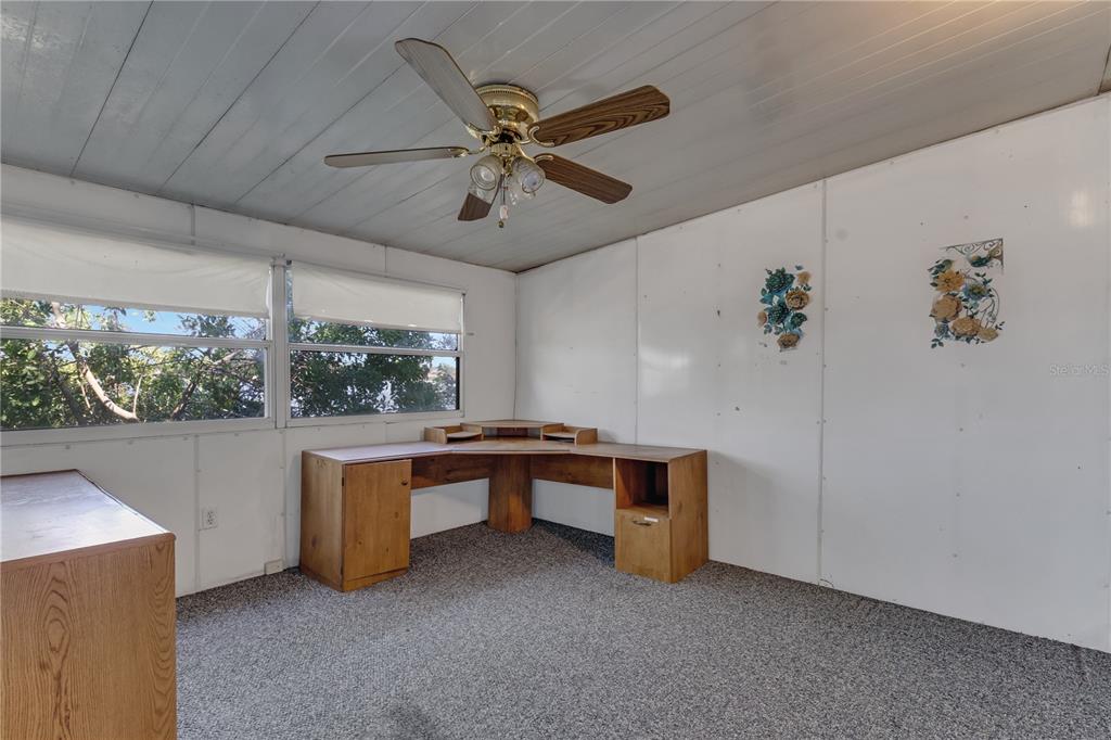 300 Beech Court Cocoa, FL 32926 - Photo 20 of 32 a view of workspace with furniture and a window
