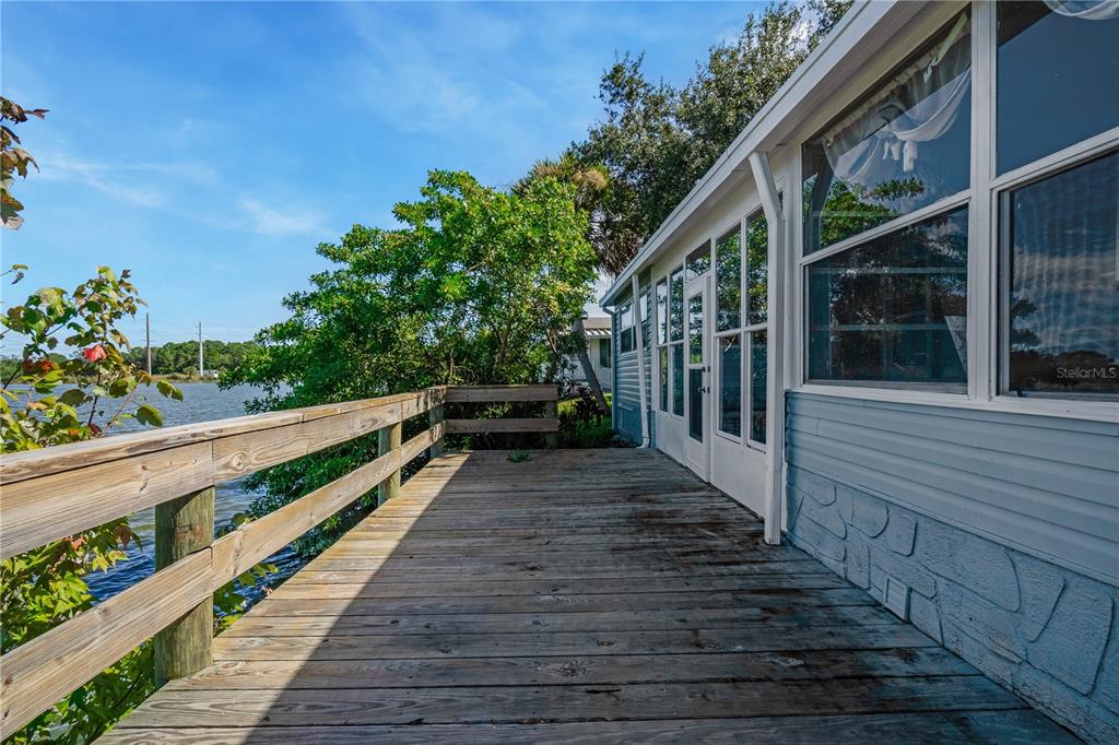 300 Beech Court Cocoa, FL 32926 - Photo 21 of 32 a view of a wooden balcony