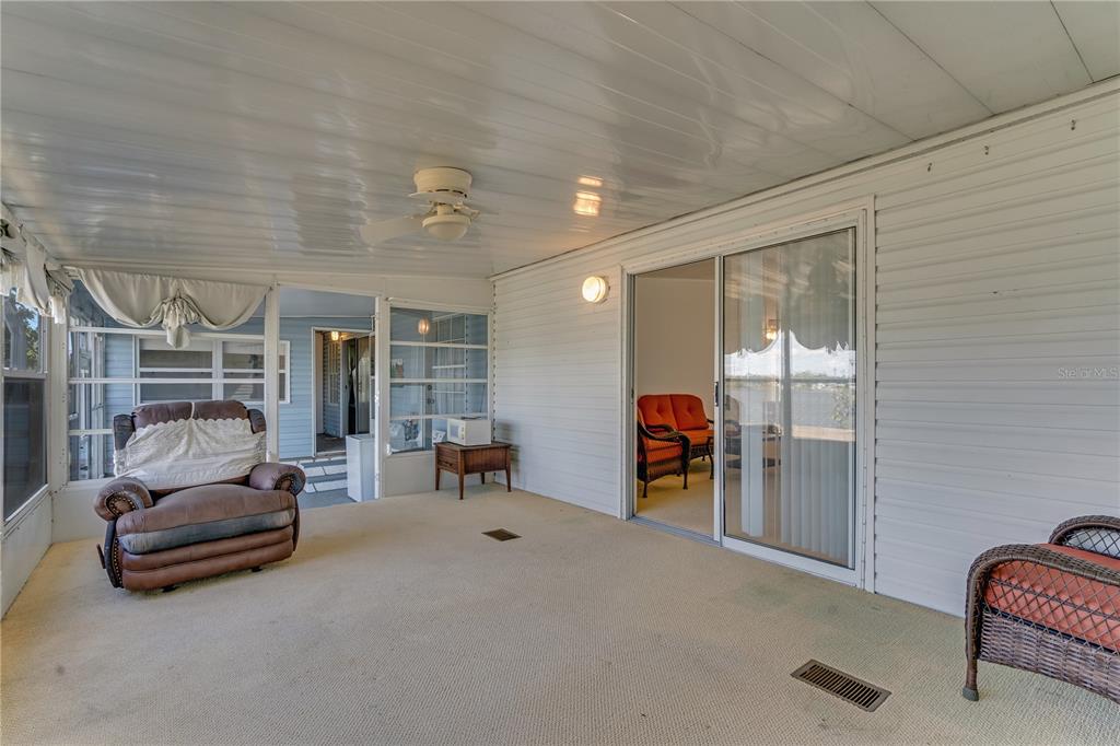 300 Beech Court Cocoa, FL 32926 - Photo 24 of 32 a living room with furniture and gym equipment