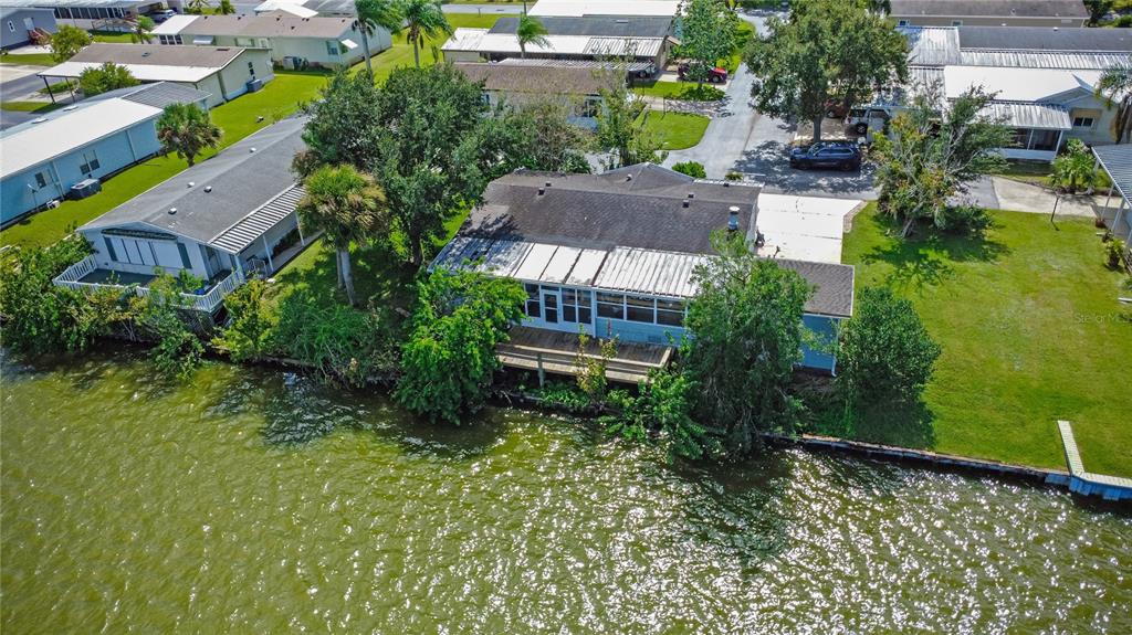 300 Beech Court Cocoa, FL 32926 - Photo 30 of 32 a aerial view of a house with a yard