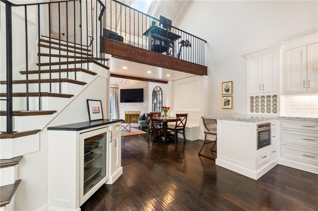 1421 North Druid Hills Road Northeast Atlanta, GA 30319 - Photo 1 of 1 a living room with furniture and a fireplace