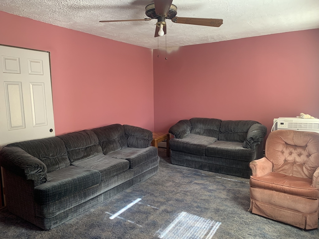 8 Avon Place Boston, MA 02129 - Photo 11 of 23 a living room with furniture