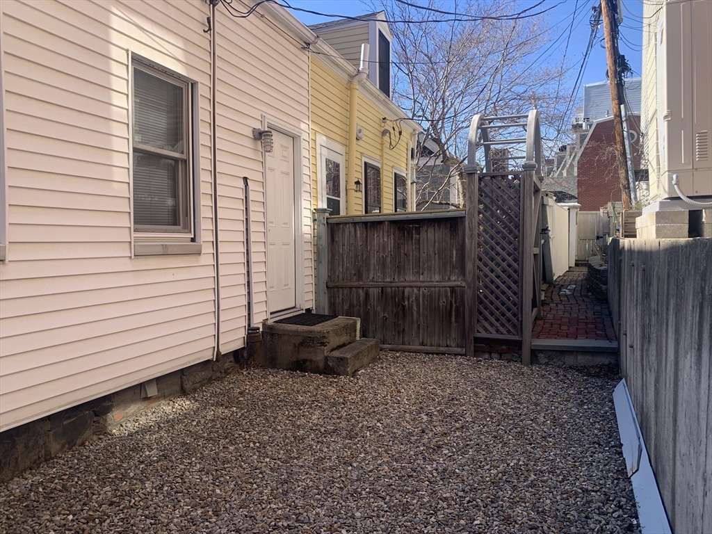 8 Avon Place Boston, MA 02129 - Photo 23 of 23 a view of a house with a yard