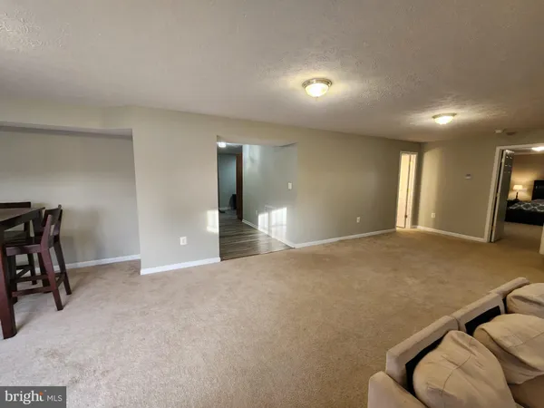 a view of a livingroom with furniture and a couch