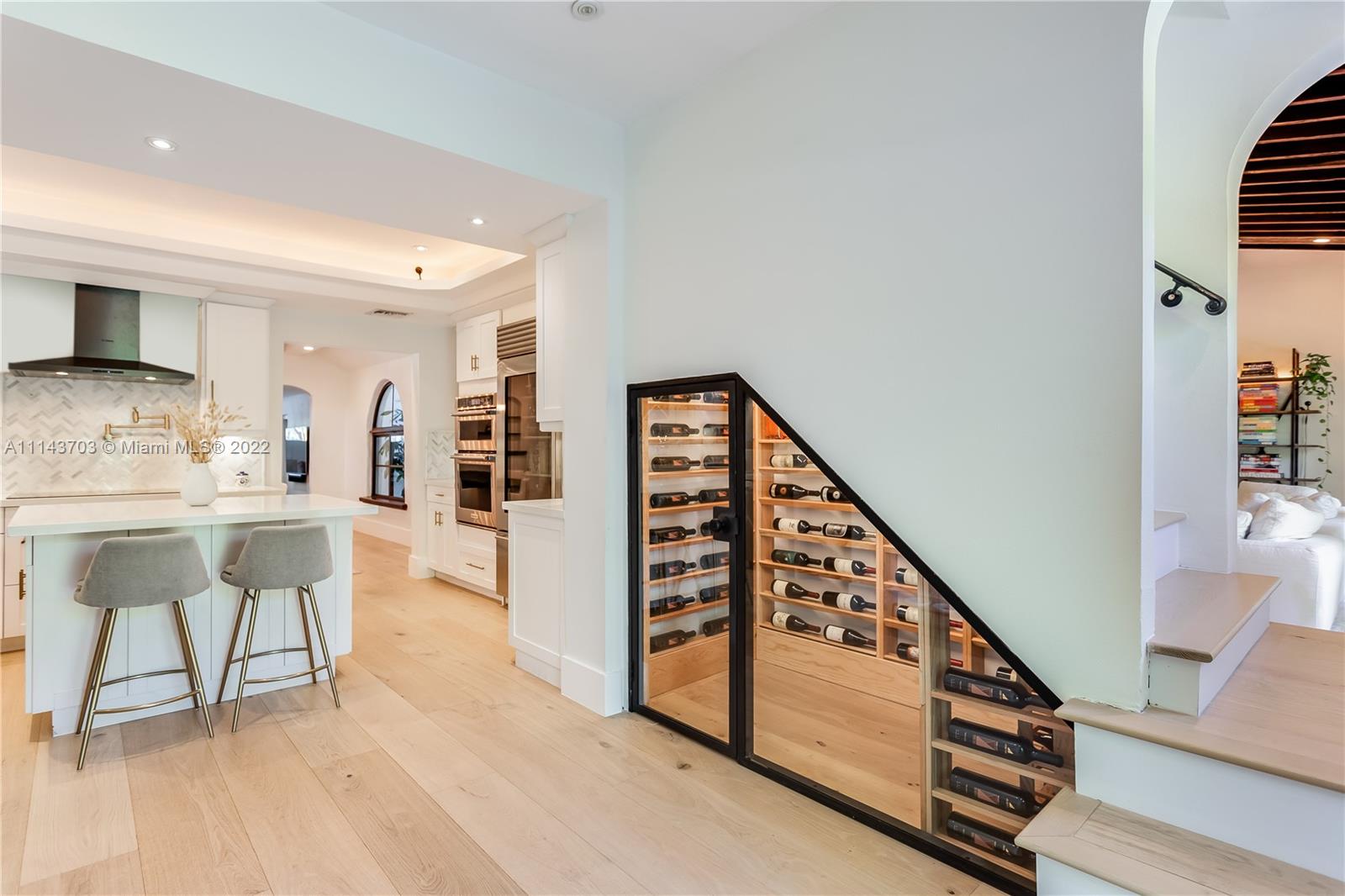 4422 Alton Road Miami Beach, FL 33140 - Photo 10 of 37 a view of an entryway and kitchen