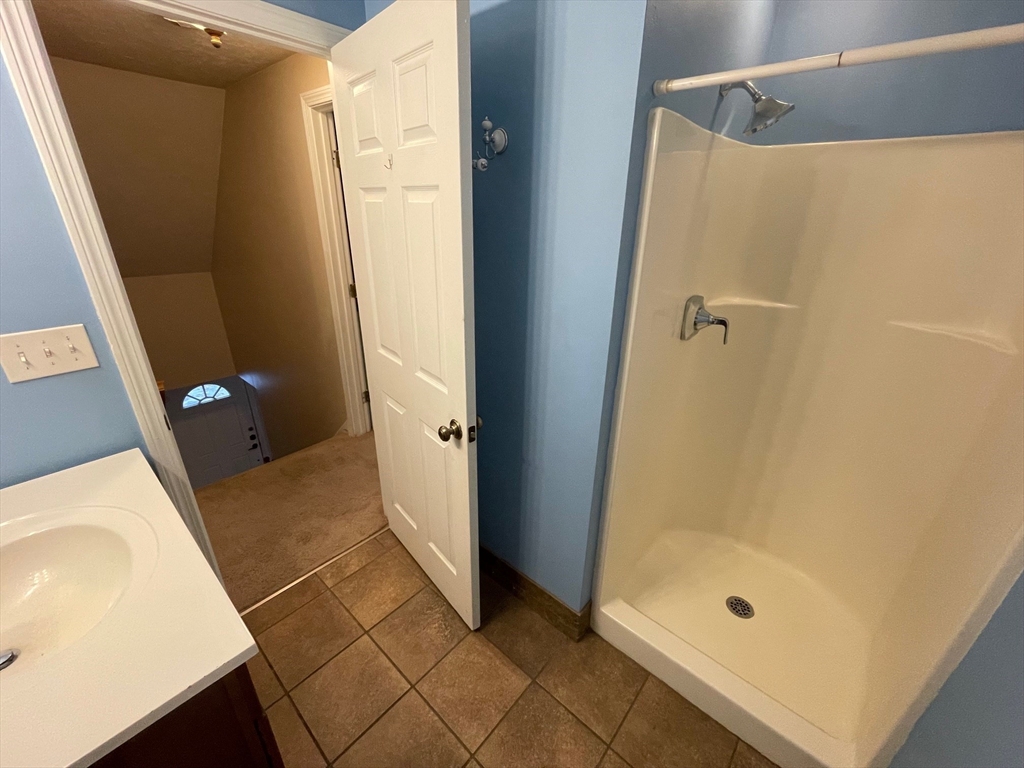 16 Bowstring Way Marlborough, MA 01752 - Photo 17 of 25 a bathroom with a shower and a sink
