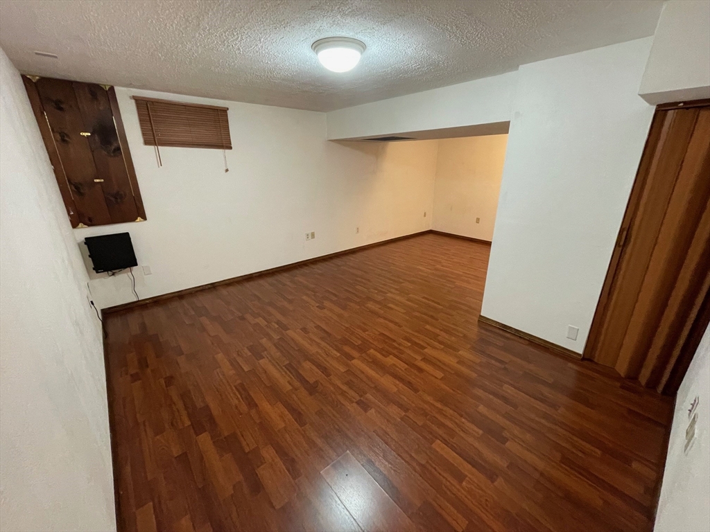 16 Bowstring Way Marlborough, MA 01752 - Photo 18 of 25 wooden floor in an empty room