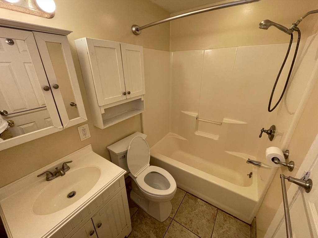 16 Bowstring Way Marlborough, MA 01752 - Photo 9 of 25 a bathroom with a sink a toilet and shower