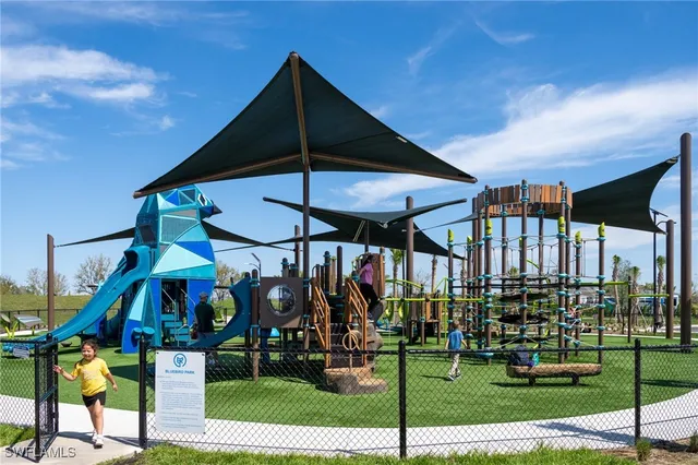 a view of swimming pool with outdoor seating