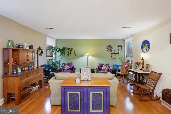a view of a living room and dining room