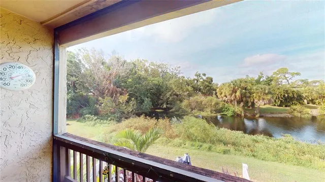 a view of a lake from a balcony