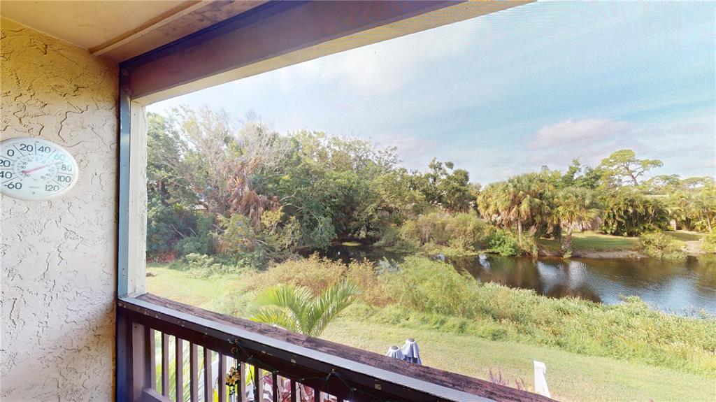 3415 Clark Road, Unit 215 Sarasota, FL 34231 - Photo 15 of 18 a view of lake from a window
