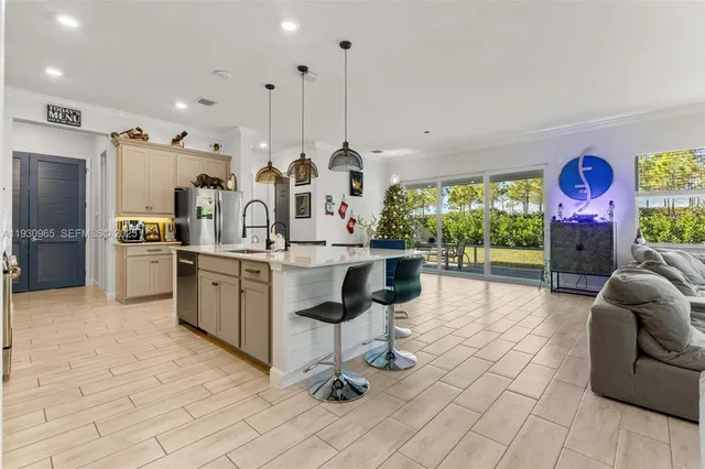 a very nice looking kitchen with a large window