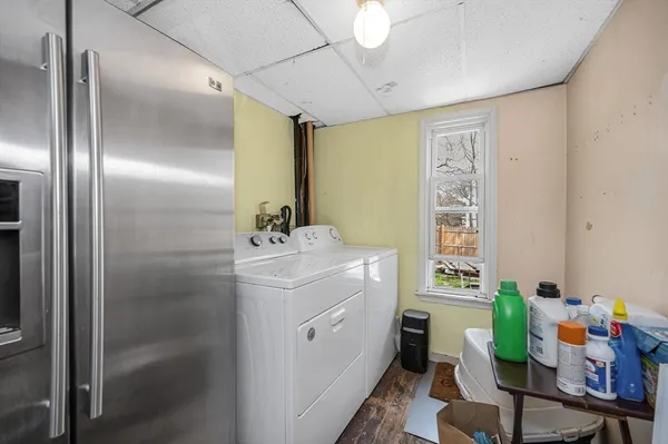 a bathroom with a sink mirror and toilet