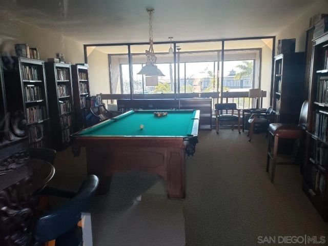 a kitchen with a sink stove and microwave